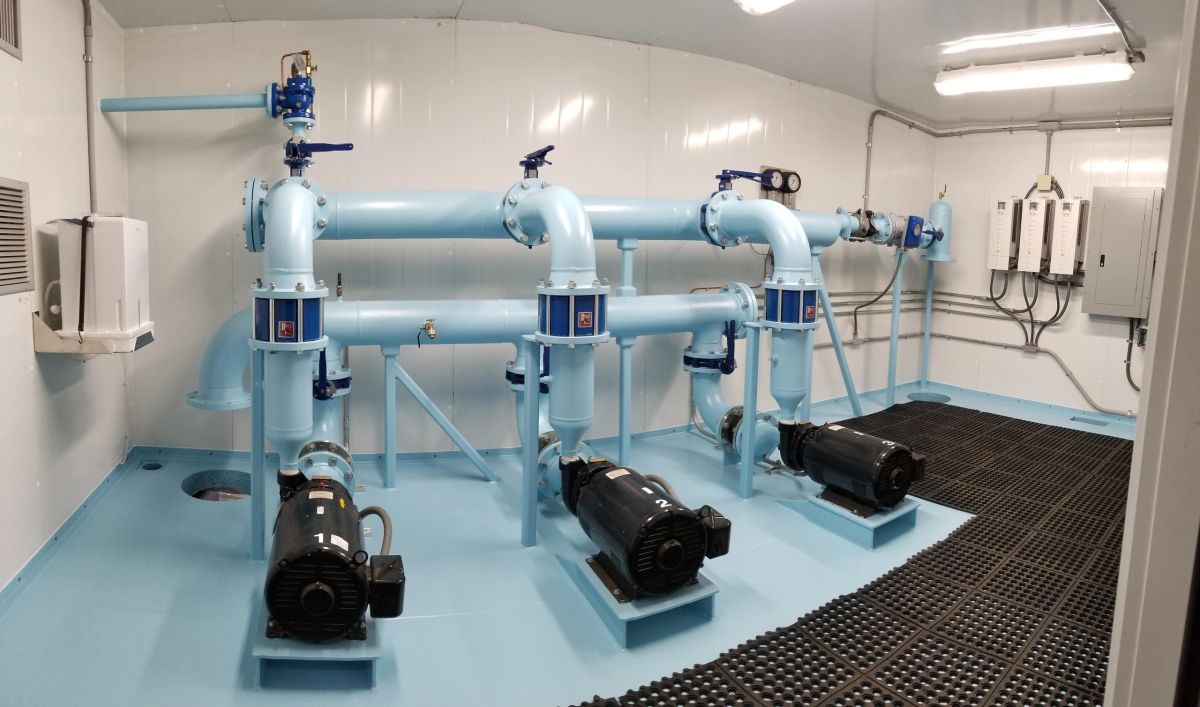 Modular packaged water booster station with horizontal pumps inside Dakota Pump enclosure